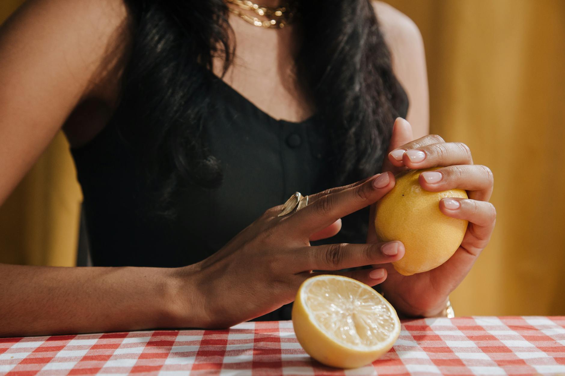 Bright ripe lemons on a pastel background, symbolizing renewed sensation and vitality