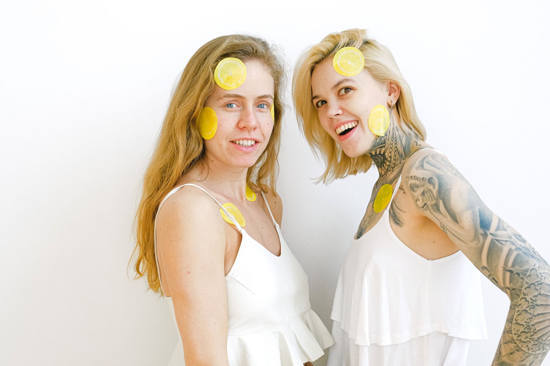 Yellow silicone vibrator with fresh bananas on a soft yellow background