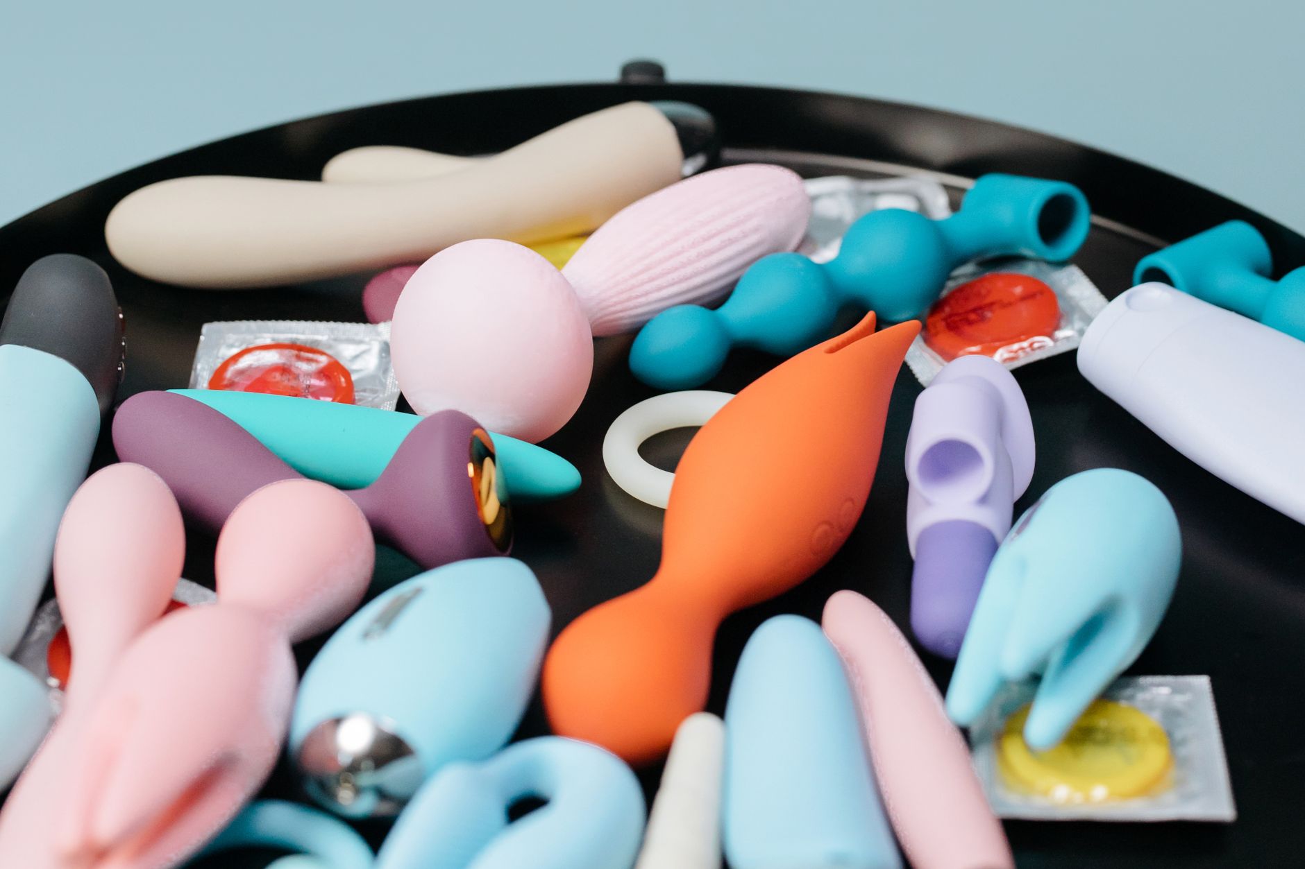 Woman holding lemon clitoral vibrators with confidence and ease